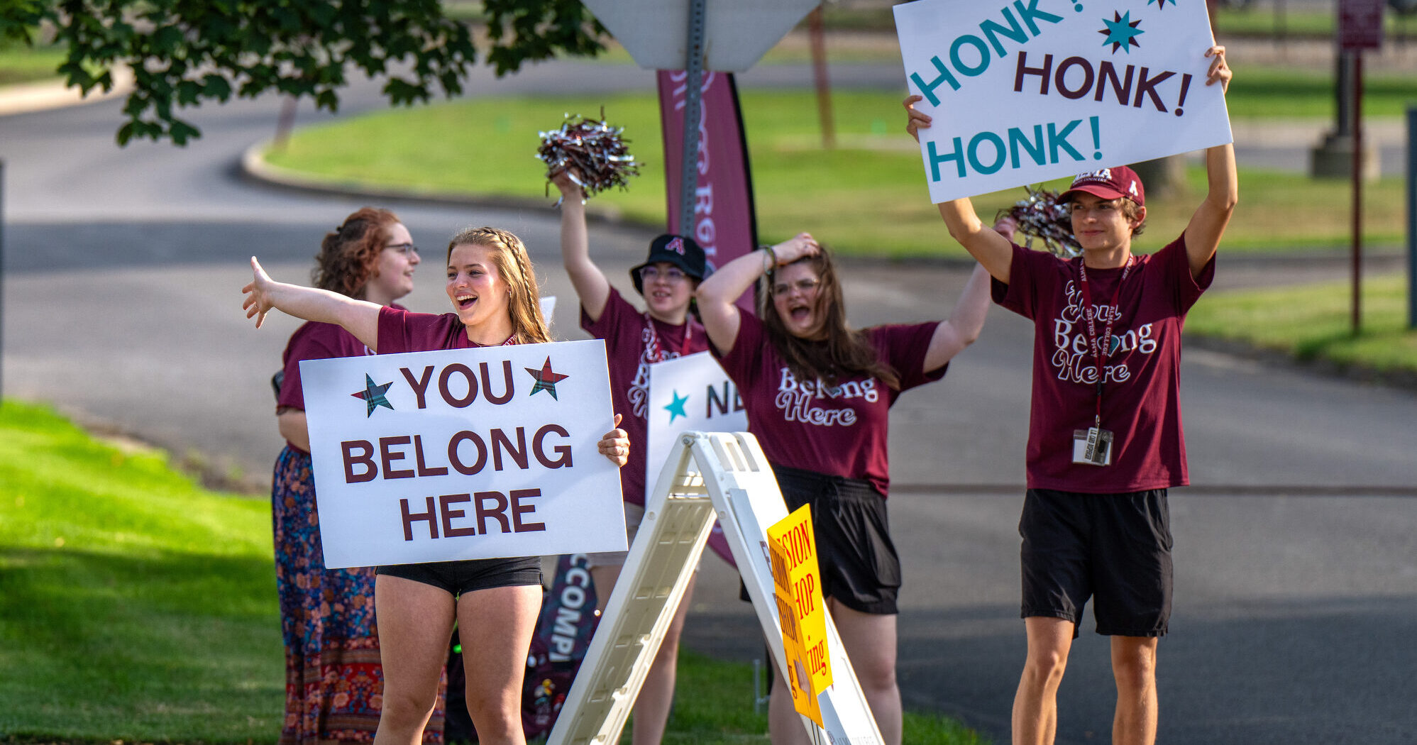 First-year guides greeting students coming to campus.