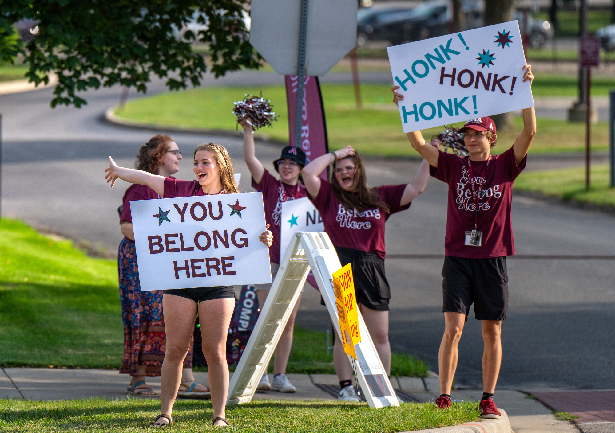 First-year guides greeting students coming to campus.