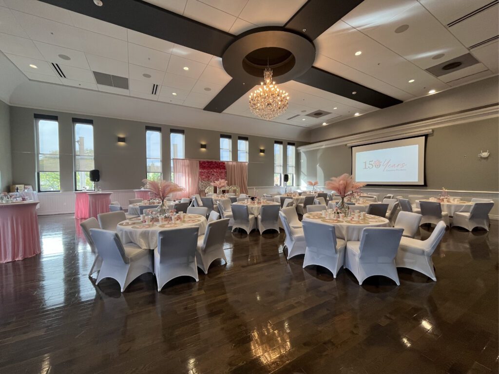 Photograph of an event happening in the Opera House Ballroom at Alma College.