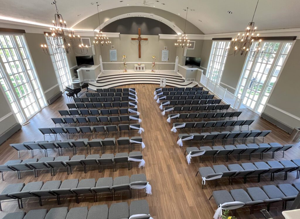 The Alma College Chapel is set up with chairs ready for service.